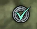 Round marker with a check mark on it